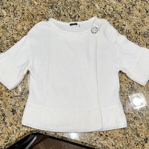 Luxury Magaschoni wrap front sweater cardigan with jeweled neck closure.